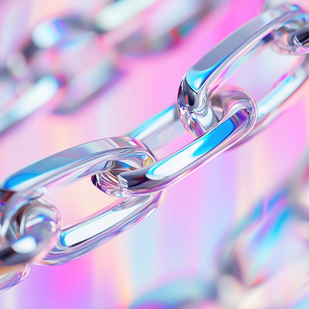 Shimmering metal chains on a prism pink and blue background